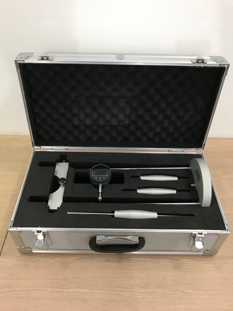 thiết bị đo độ co ngót của vữa xi măng